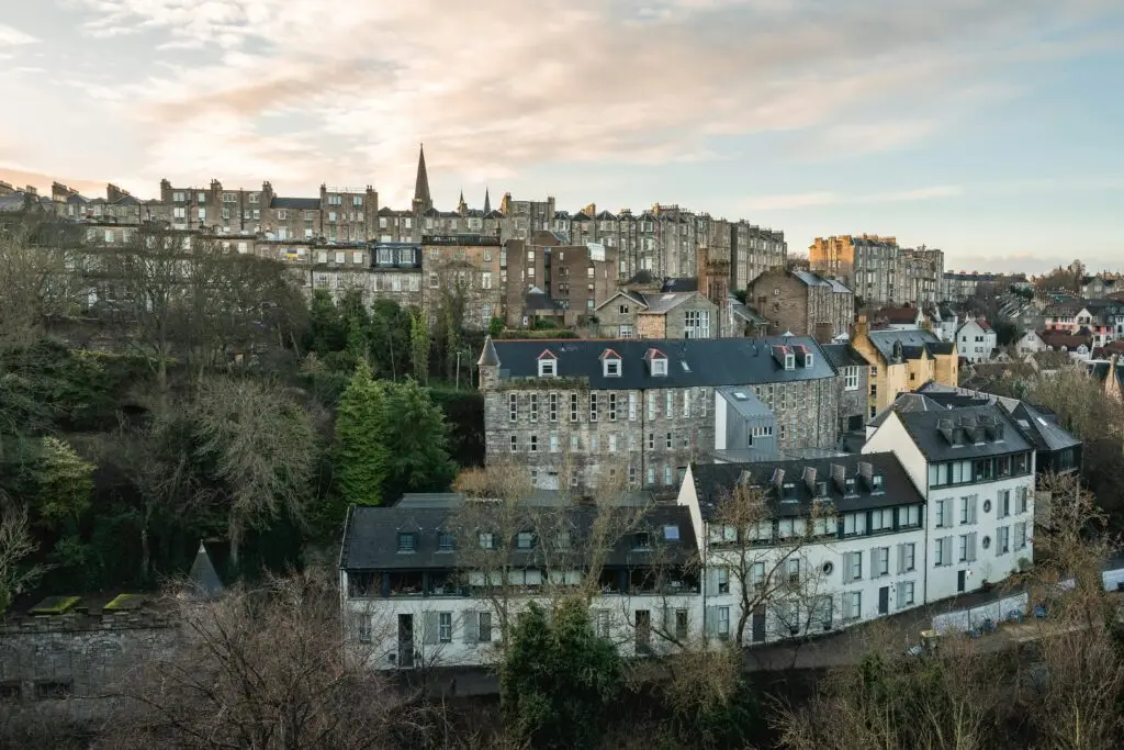 Charming cityscape of Edinburgh's historic buildings at dusk, showcasing classic architecture.